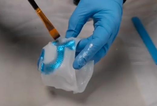 brushing mica powder micapowder onto silicon mold and resin