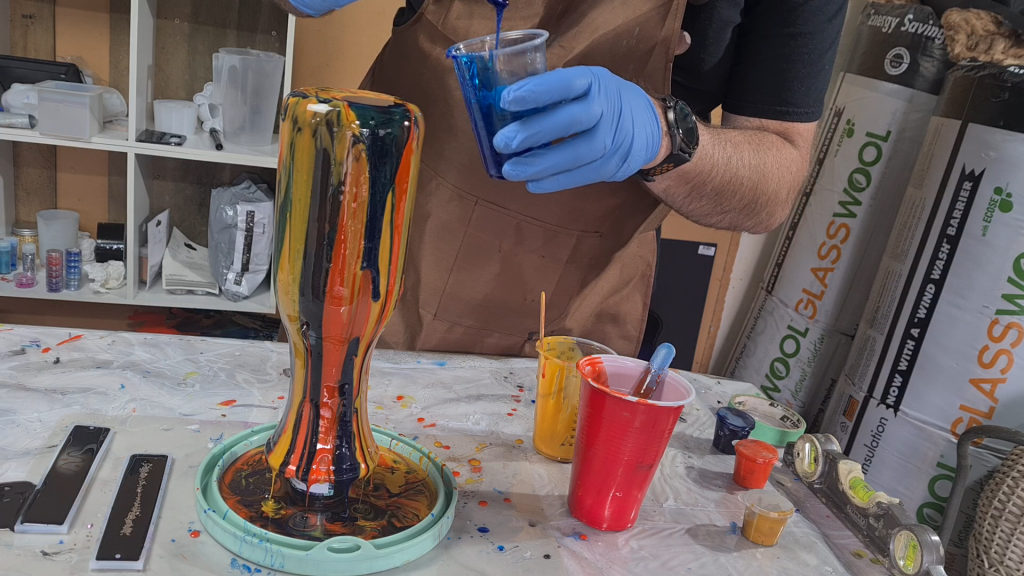 resin pouring on glass vase trying to get resin to stick to glass